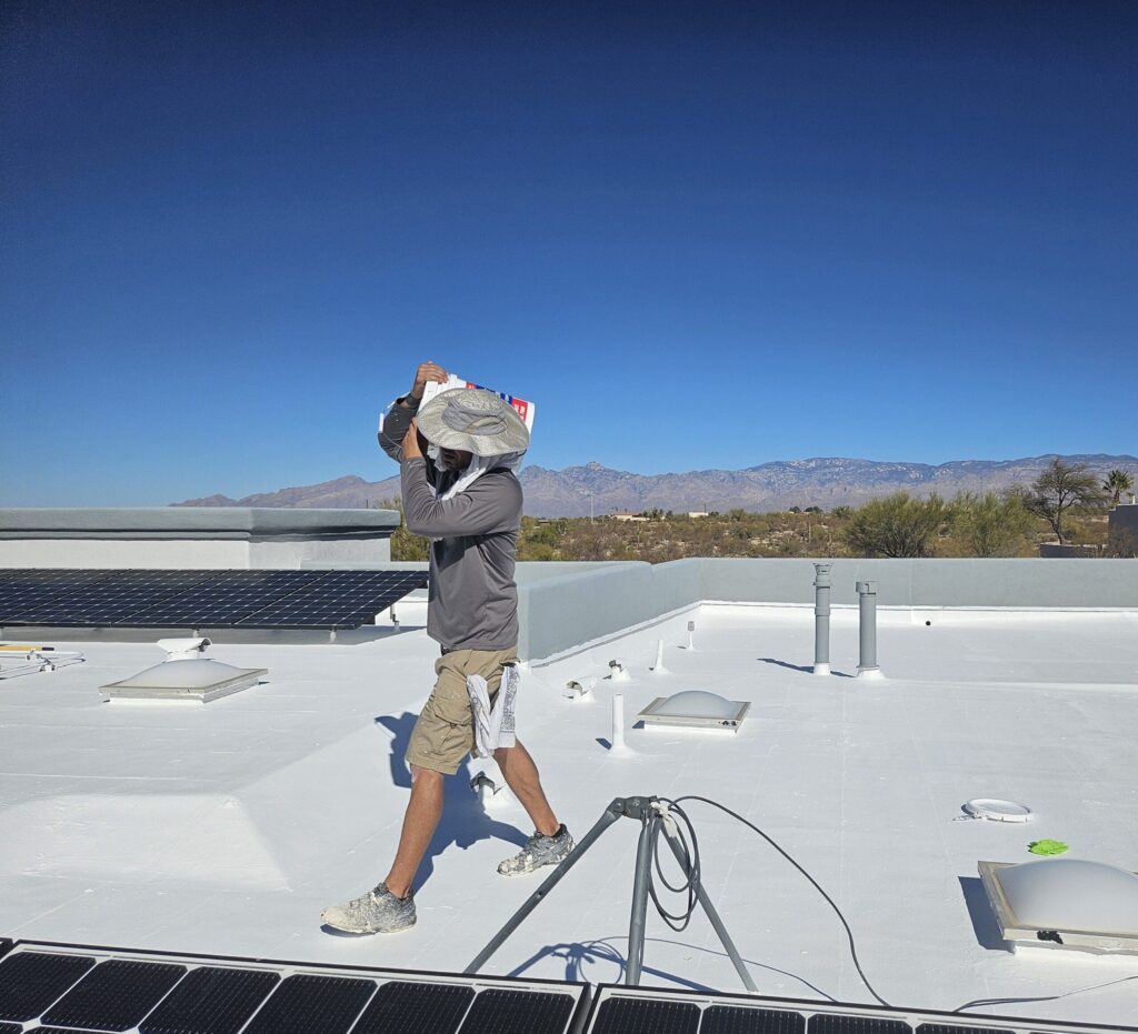 man doing roof inspection